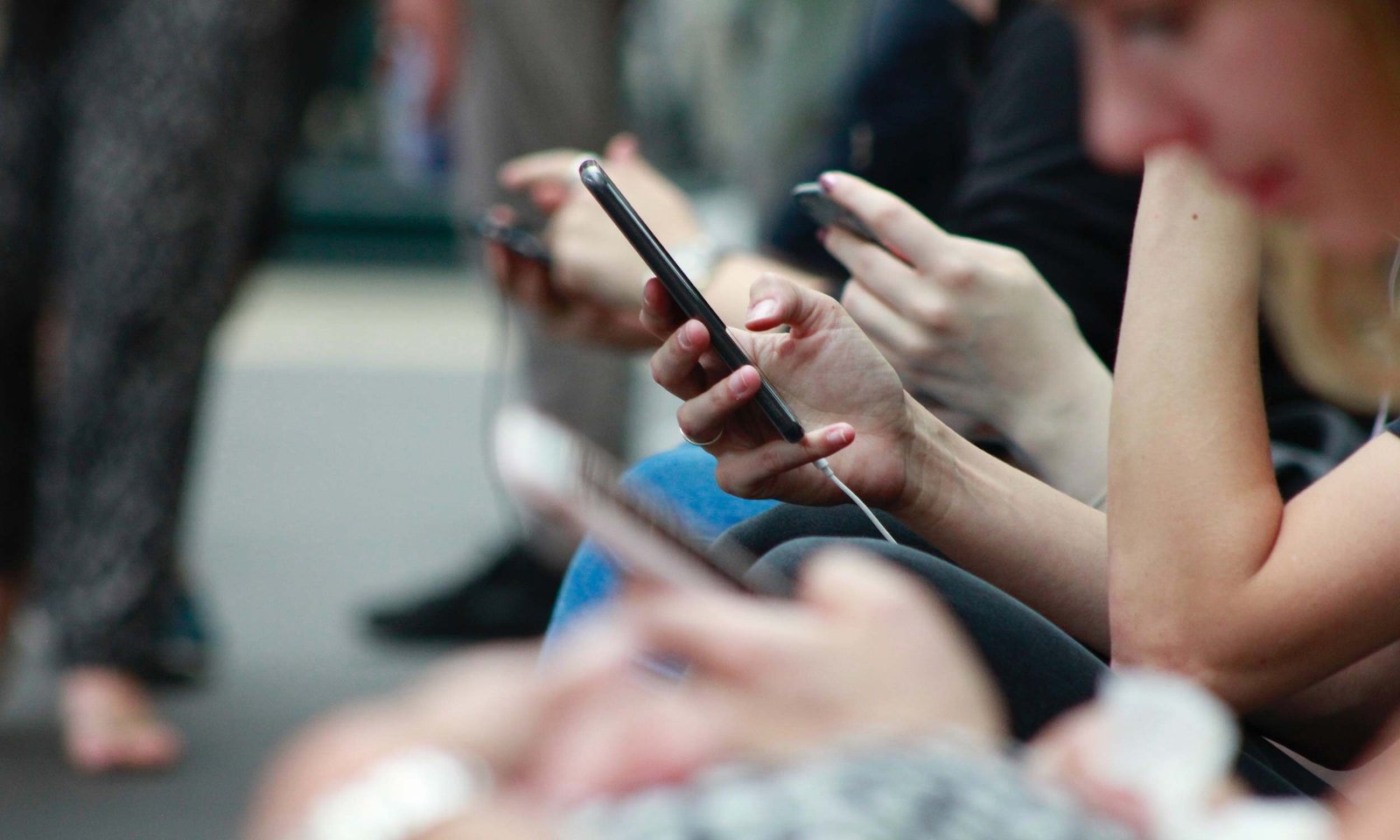 people on their phone
